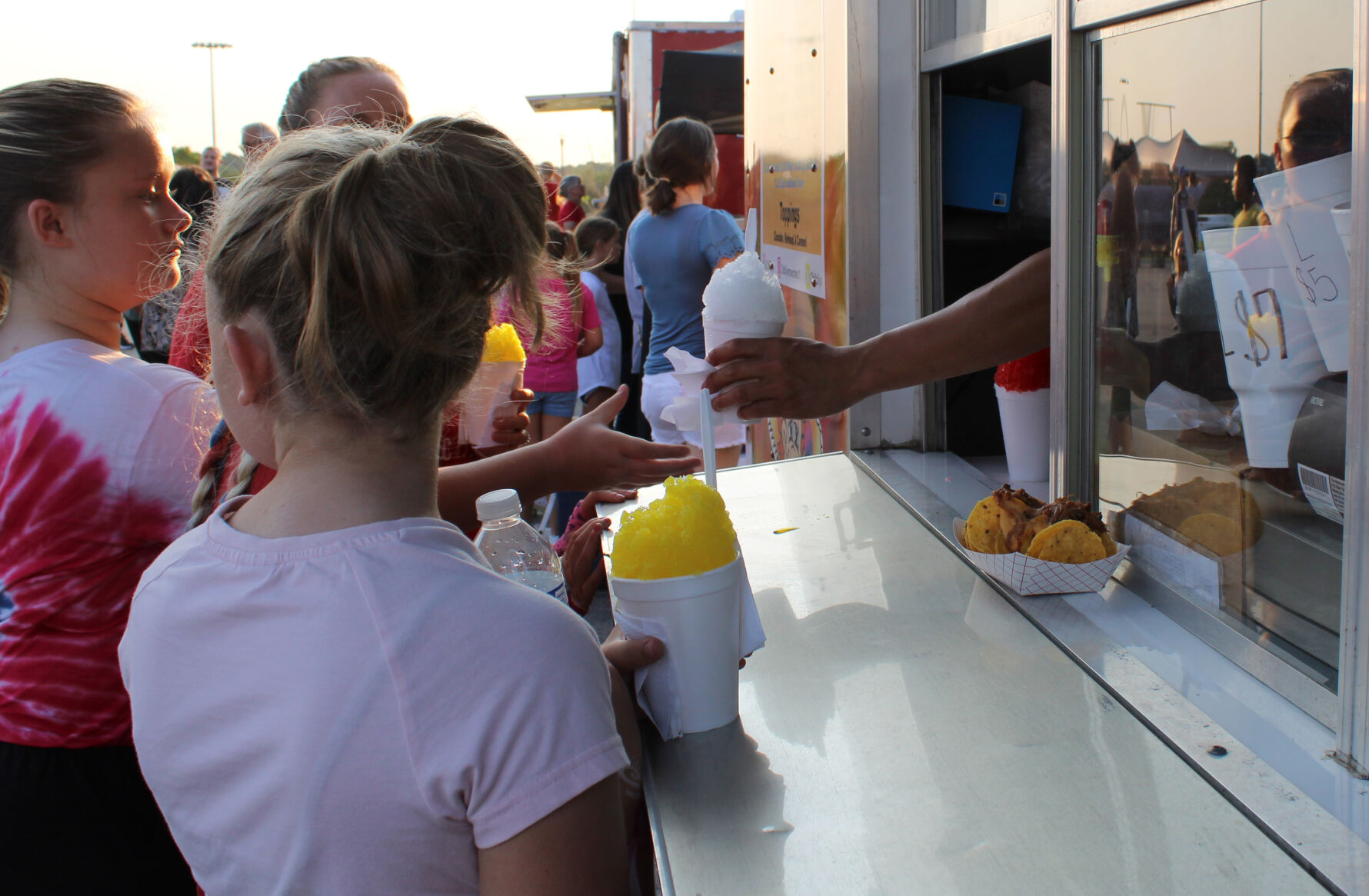 Shouse sisters buy snow cones